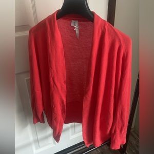 Beautiful red/pink color. Lightweight cover up jacket.